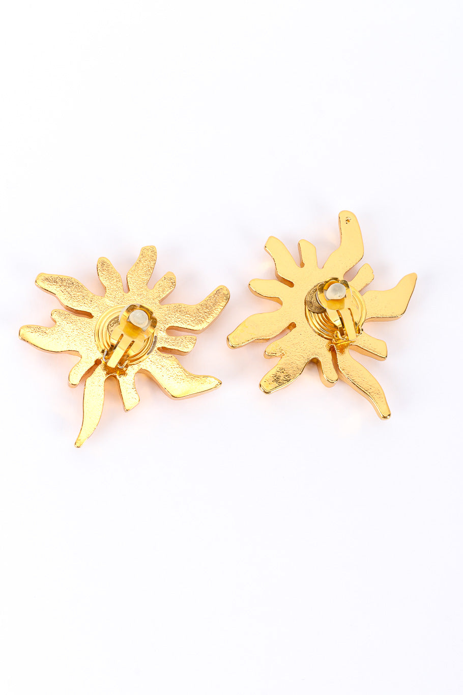 Sunburst earrings by Christian Lacroix on white background earring backs @recessla