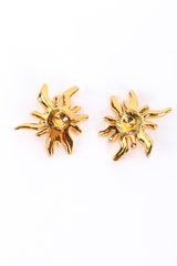 Sunburst earrings by Christian Lacroix on white background @recessla