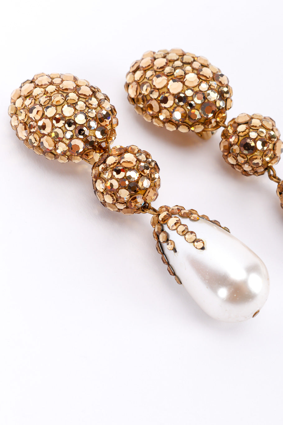 Vintage rhinestone pearl drop earrings on white background tops close @recessla