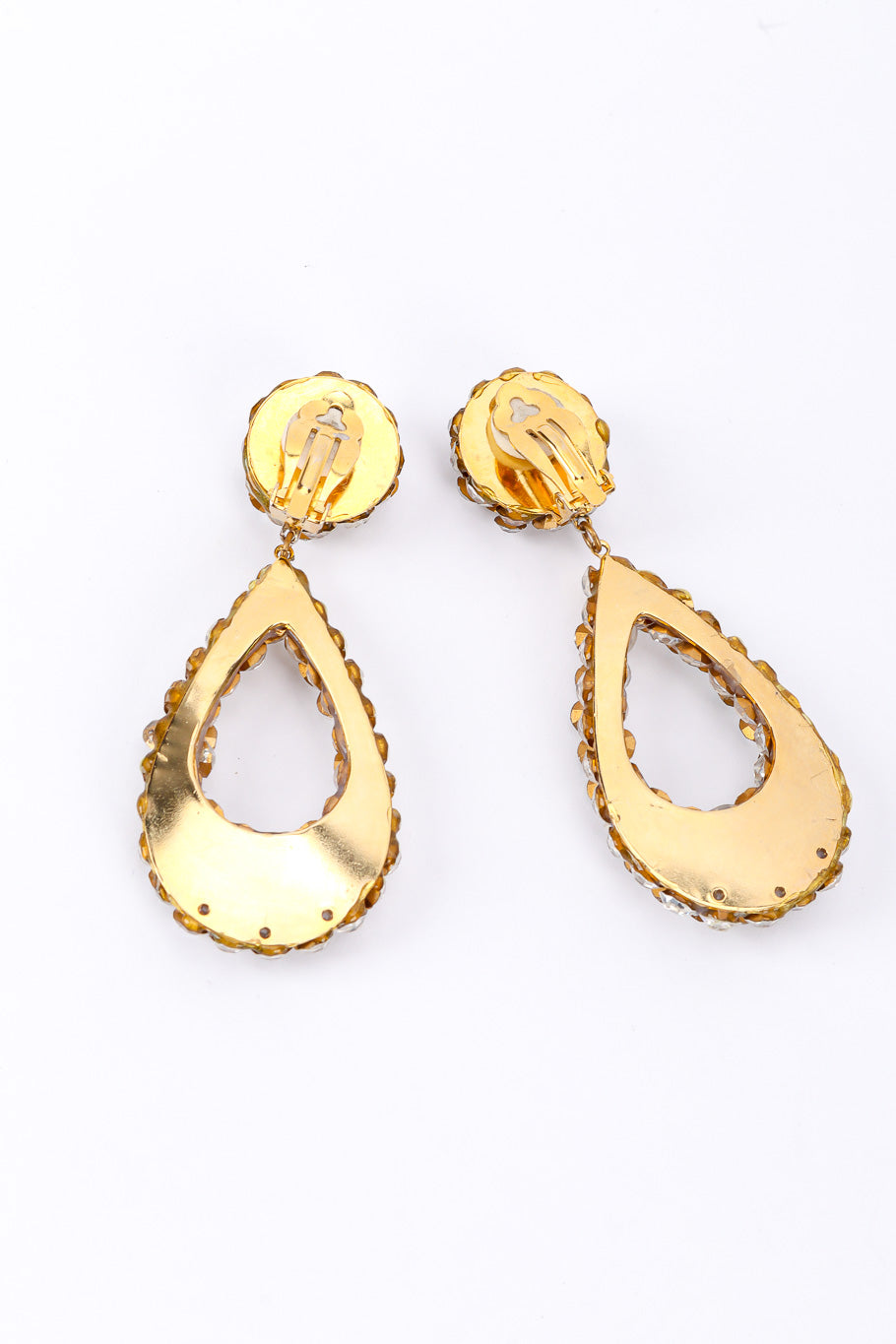 Vintage rhinestone tear-drop earrings on white background backs @recessla