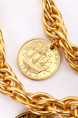 Chain link belt with coin charms on white background coin back close @recessla