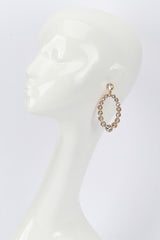 Kenneth Jay Lane Oval Crystal Hoop Drop Earrings on mannequin @recess la