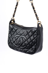 Chanel Quilted CC Shoulder Bag 3/4 front suspended by strap @recess la