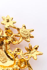 Vintage Christian LaCroix Floral Heart Brooch signature cartouche closeup on white backdrop @Recessla