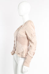 Silk jacket by Gucci on mannequin side @recessla