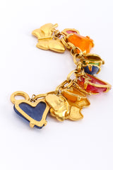 Charm bracelet by Givenchy on white background in U shape @recessla