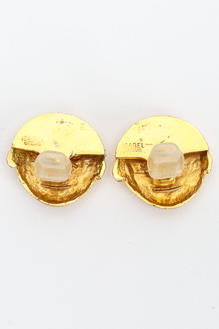 Mask earrings by Isabel Canovas on white background backs @recessla