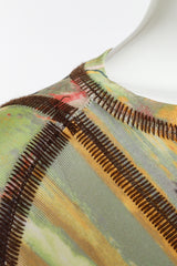 Vintage Jean Paul Gaultier ballerina print poncho cape flat lay detail of the pulls in the bone stitching @RECESS LA