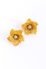 Sculpted flower earrings by James Arpad on white background @recessla