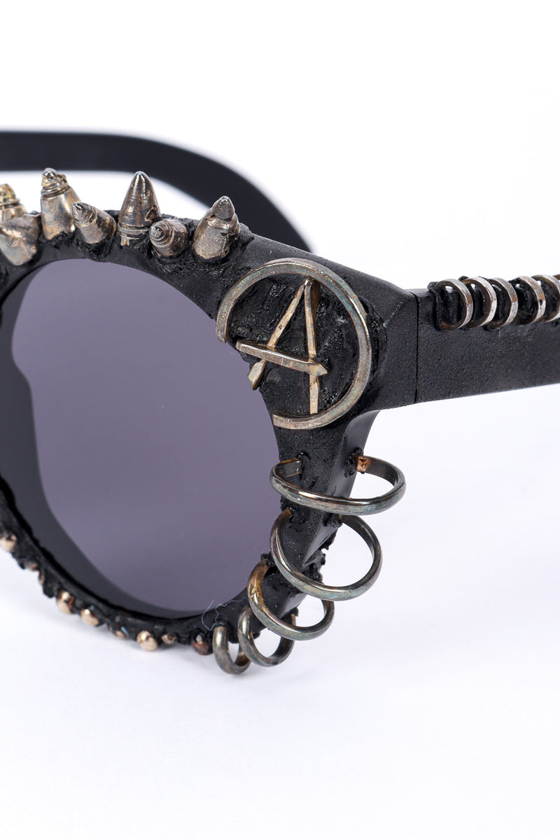 Anarchy sunglasses by Kuboraum on white background anarchy A close @recessla