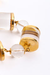 Lucite cylinder link necklace on white background gold beads close @recessla