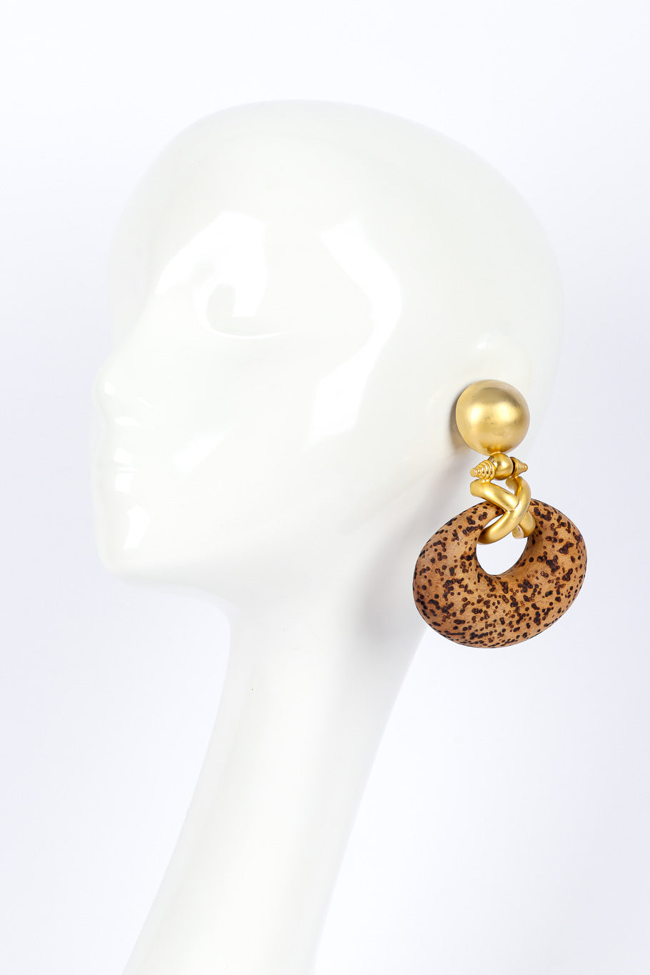 Cork earrings by Gianfranco Ferre on white background on mannequin @recessla