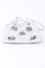 Miu Miu Metallic Drawstring Bag bottom edge view, laid flat on white backdrop @Recessla