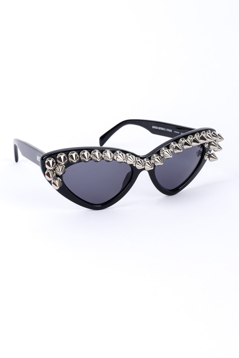 Spiked sunglasses by Moschino on white background @recessla