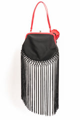 Fringe shoulder bag by Moschino on white background back of bag @recessla