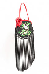 Fringe shoulder bag by Moschino on white background @recessla