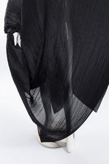 Pleats Please Issey Miyake Pleated Multi-Wrap Poncho II bottom hem on mannequin closeup @Recessla