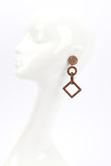 Richard Kerr crystal geometric earrings on mannequin @recessla