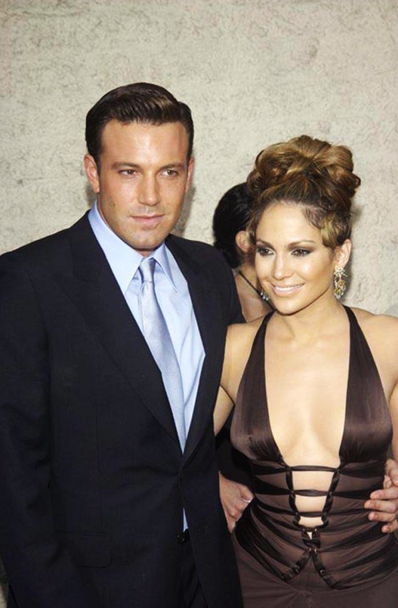 Halter dress in brown on Jennifer Lopez with Ben Affleck at the Gigli film premiere on July 27th 2003. Jim Smeal/BEI/Shutterstock