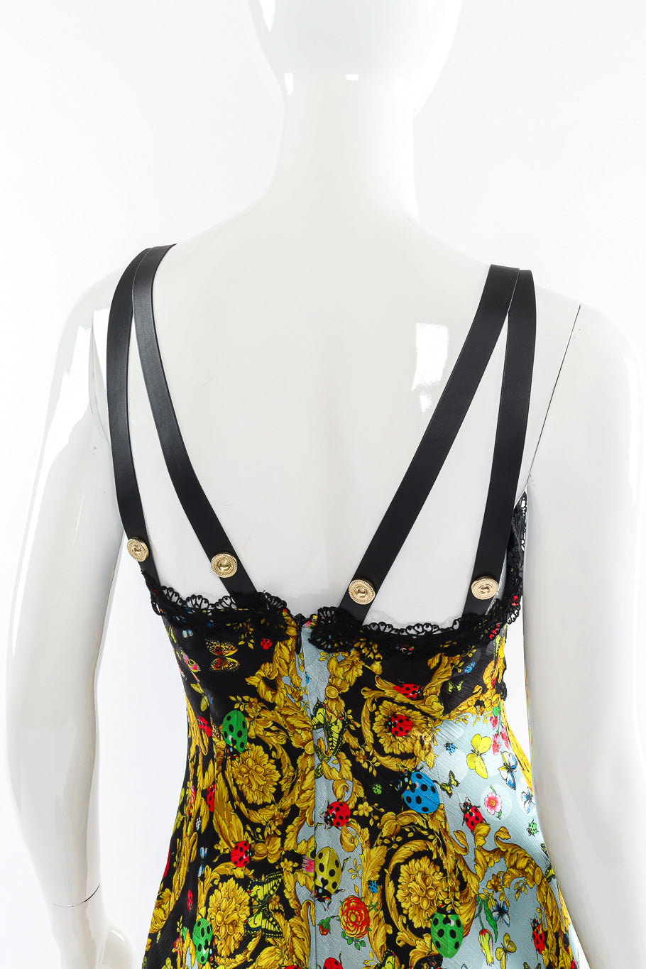 Printed mini dress by Versace Jeans Couture on mannequin back straps close @recessla