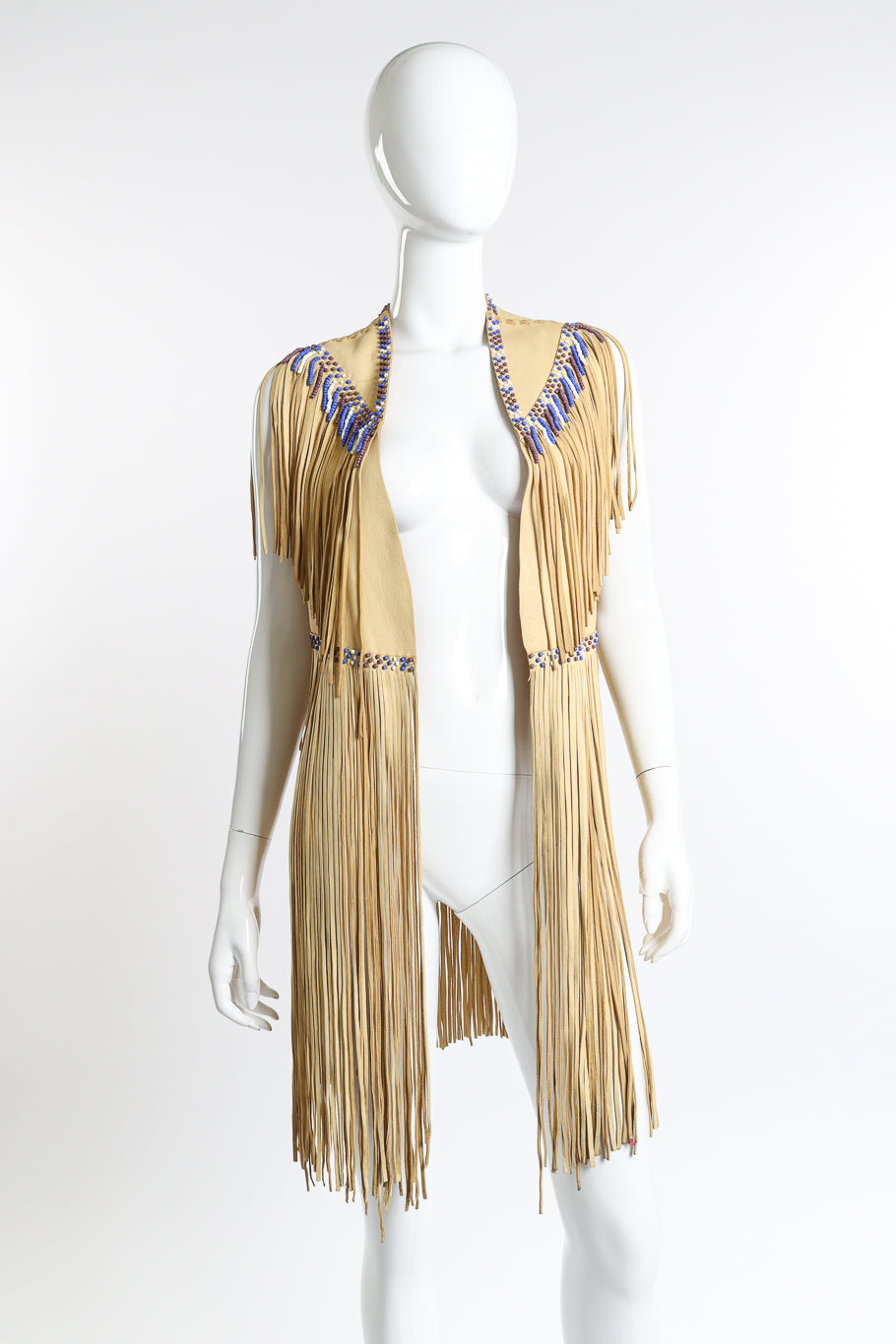 Vintage Leather Fringe Beaded Vest draped open on mannequin @Recess LA