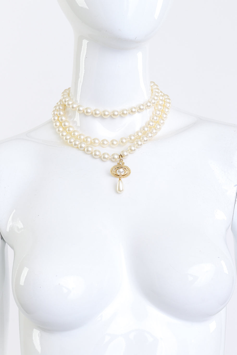 Vivienne Westwood Triple Strand Pearl Orb Necklace on manenquin @recess la