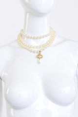 Vivienne Westwood Triple Strand Pearl Orb Necklace on manenquin @recess la