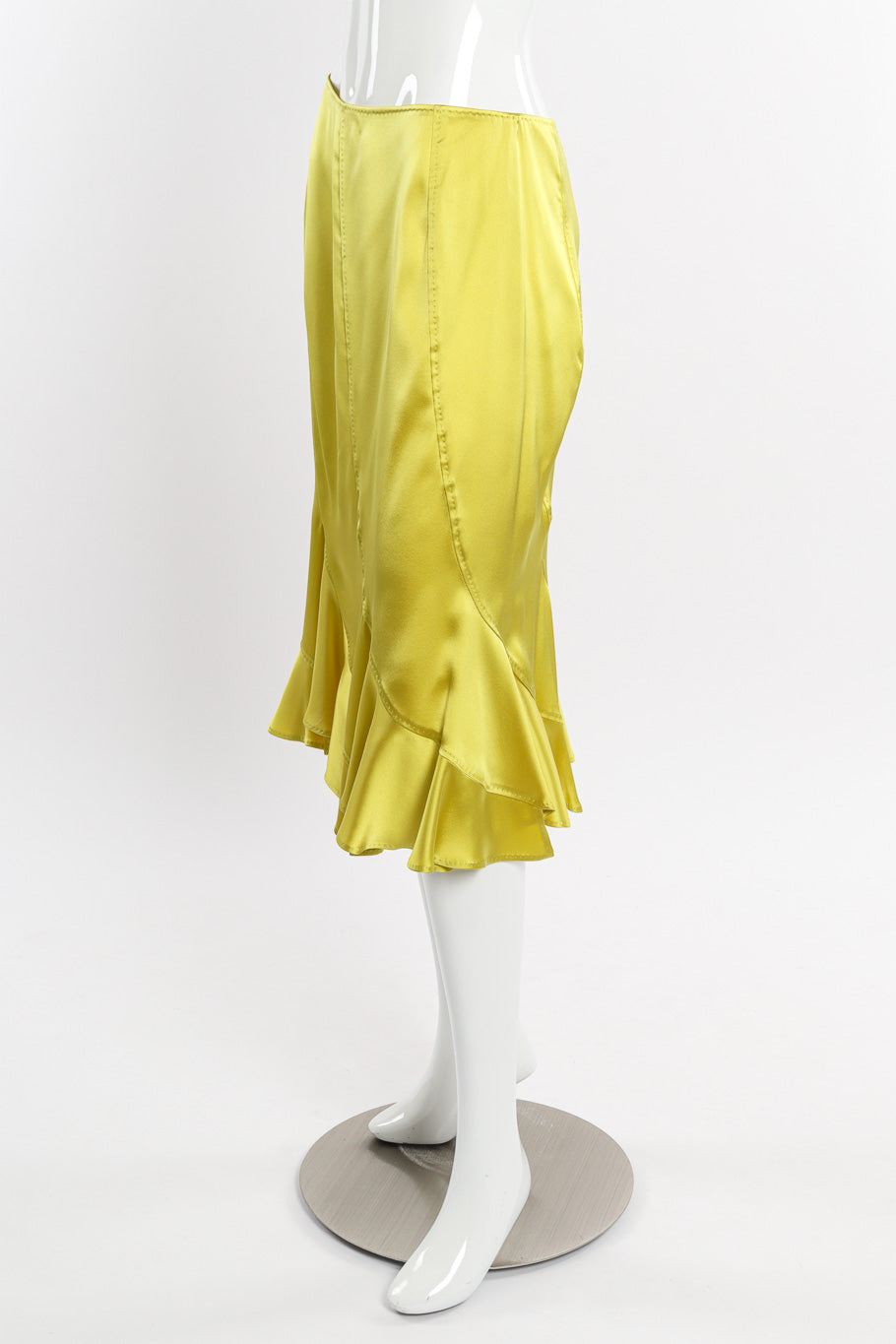 Ruffle hem skirt by Yves Saint Laurent on mannequin side @recessla