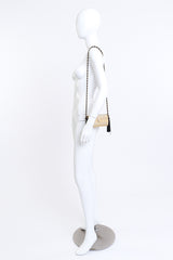 YSL "Opium" Gold Tassel Minaudière on mannequin @RECESS LA