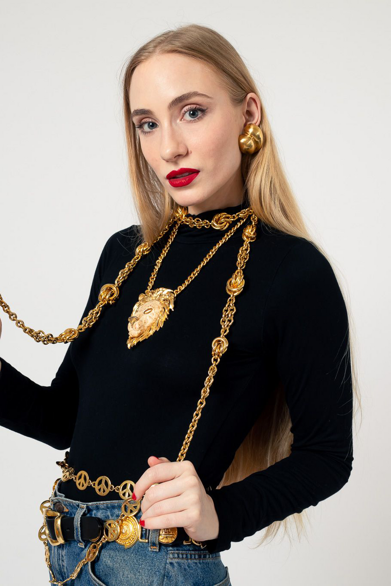 Gold metal vintage chain belt on white background on model as necklace @recessla