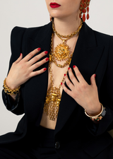 Vintage Pauline Rader Pre Colombian Mask Necklace on model in blazer @Recessla