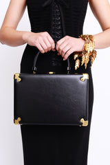 Black Leather Box Bag by Delill held by model @ recess LA