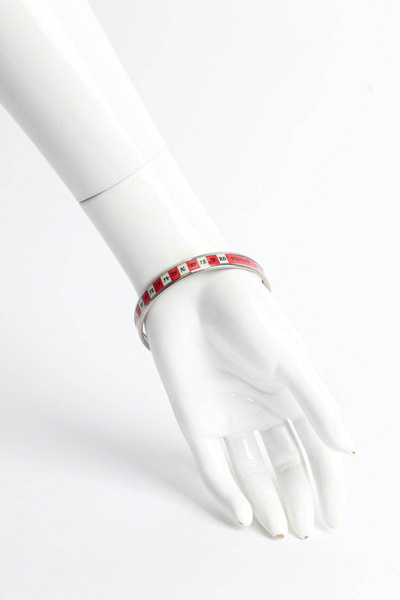 Vintage Hermés Pisces Sign Calender Narrow Enamel Bracelet on mannequin @ Recess LA