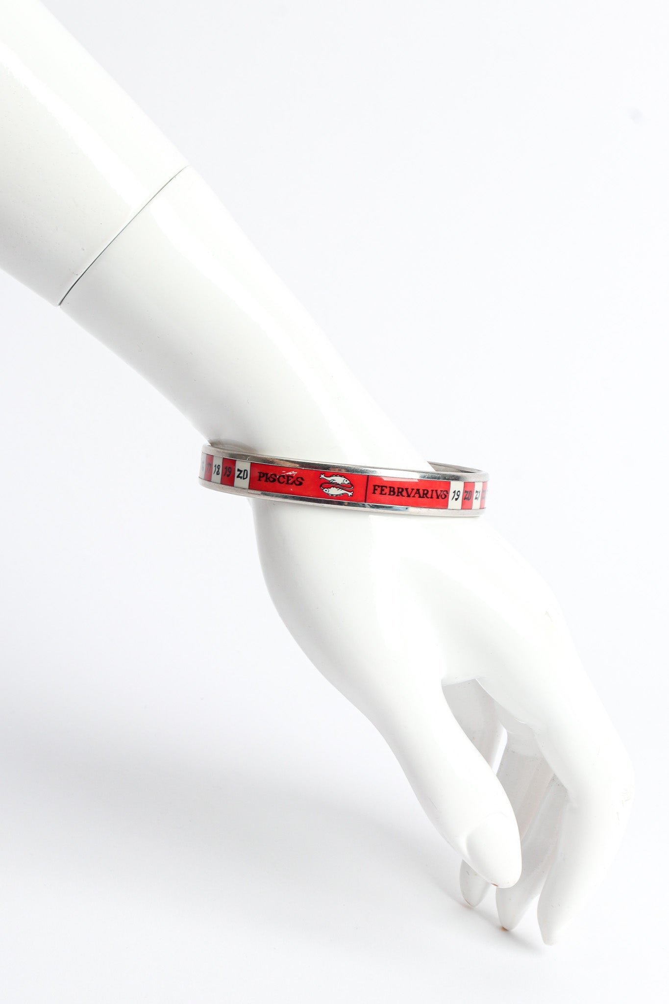 Vintage Hermés Pisces Sign Calender Narrow Enamel Bracelet on mannequin @ Recess LA