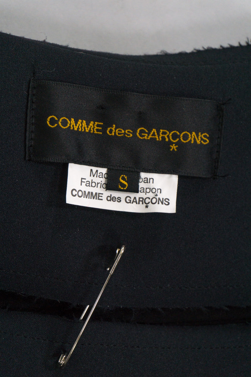 Comme des Garçons Label