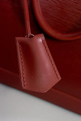 Louis Vuitton Epi Alma NM Handbag in Rubis Red