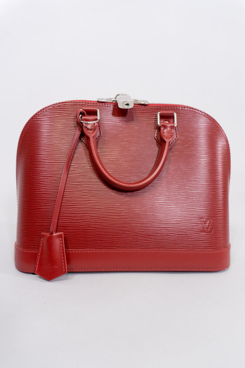 Louis Vuitton Epi Alma NM Handbag in Rubis Red