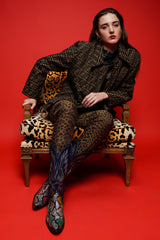 girl in Vintage Fendi Zucca Monogram Zip Swing Jacket on leopard chair @ Recess Los Angeles