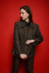 girl in Vintage Fendi Zucca Monogram Zip Swing Jacket on red background @ Recess Los Angeles