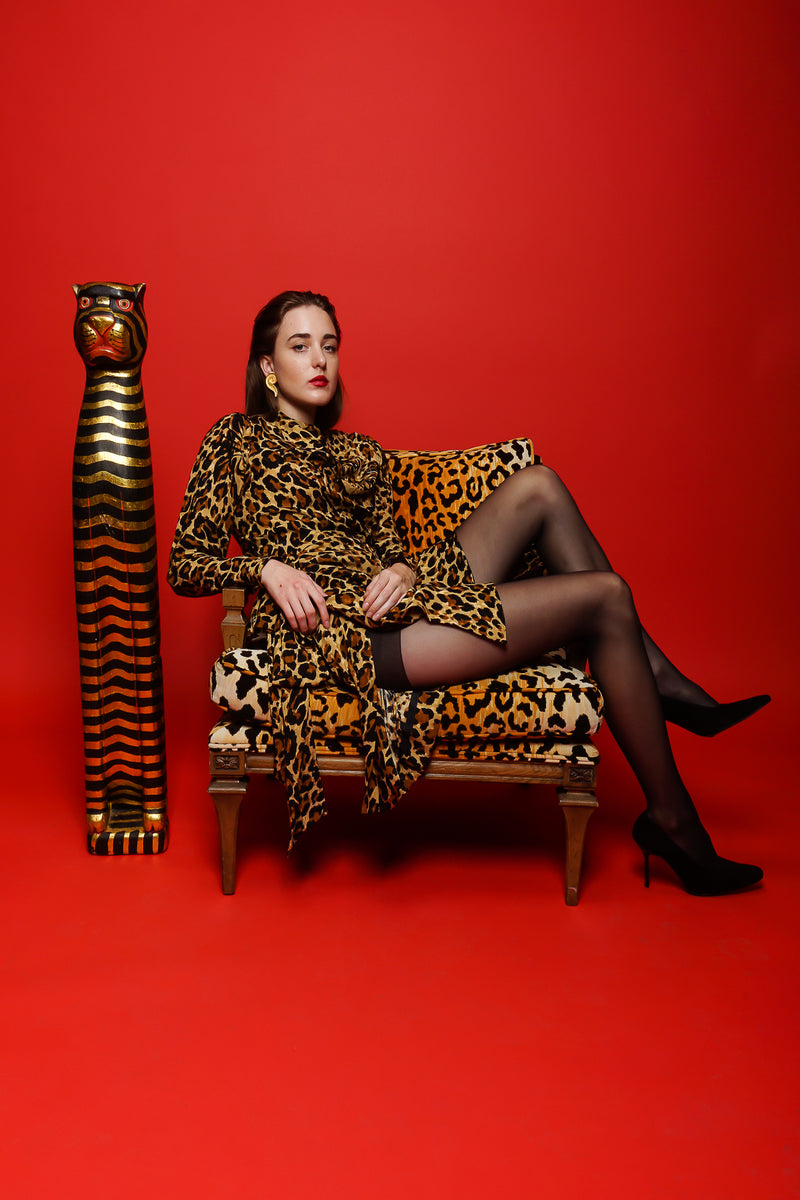 Girl in Vintage Yves Saint Laurent YSL Leopard Scarf Dress on red backdrop @ Recess Los Angeles