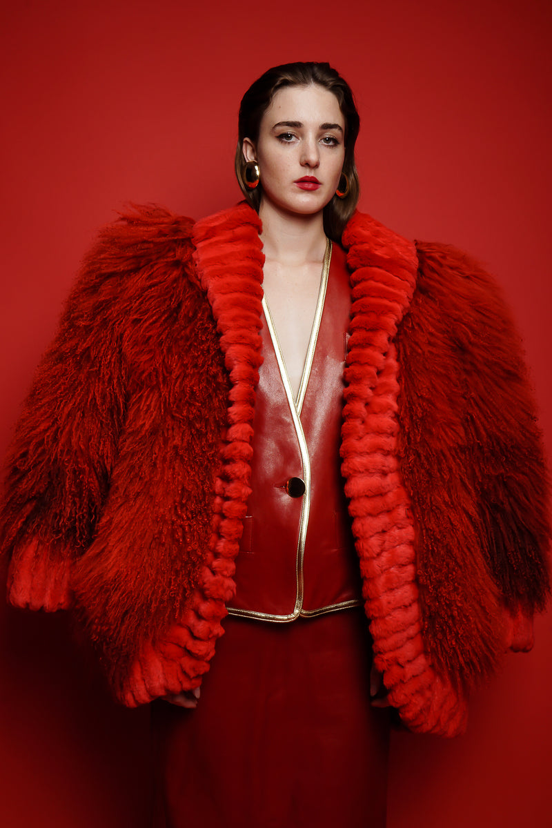 girl in Vintage Evans Red Mongolian Fur Shawl Collar Coat & YSL red leather suit on red @ Recess LA