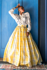 Monica Ahanonu in Vintage Escada Plaid Taffeta Ball Skirt with blue door at Recess Los Angeles