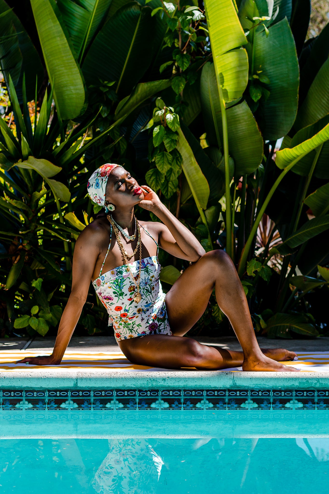 Monica Ahanonu in Vintage Gucci V. Accornero Black Flora Scarf and flora swimsuit @ Recess LA