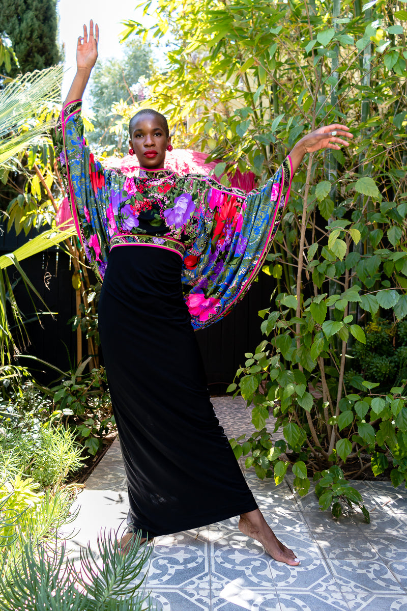 Monica Ahanonu in Vintage Leonard Floral Batwing Cape Gown at Recess Los Angeles