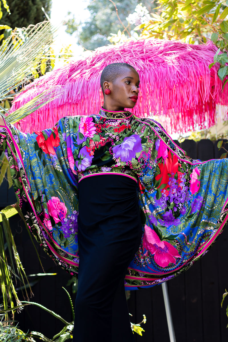 Monica Ahanonu in Vintage Leonard Floral Batwing Cape Gown at Recess Los Angeles