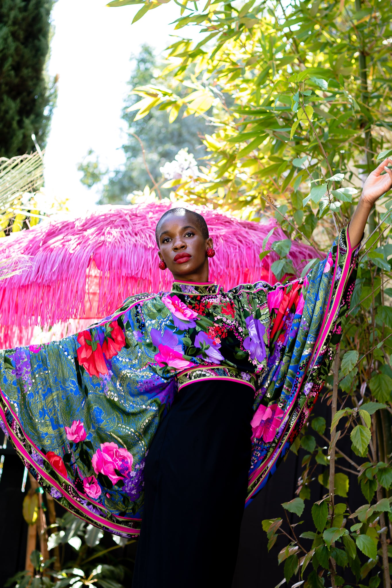 Monica Ahanonu in Vintage Leonard Floral Batwing Cape Gown at Recess Los Angeles