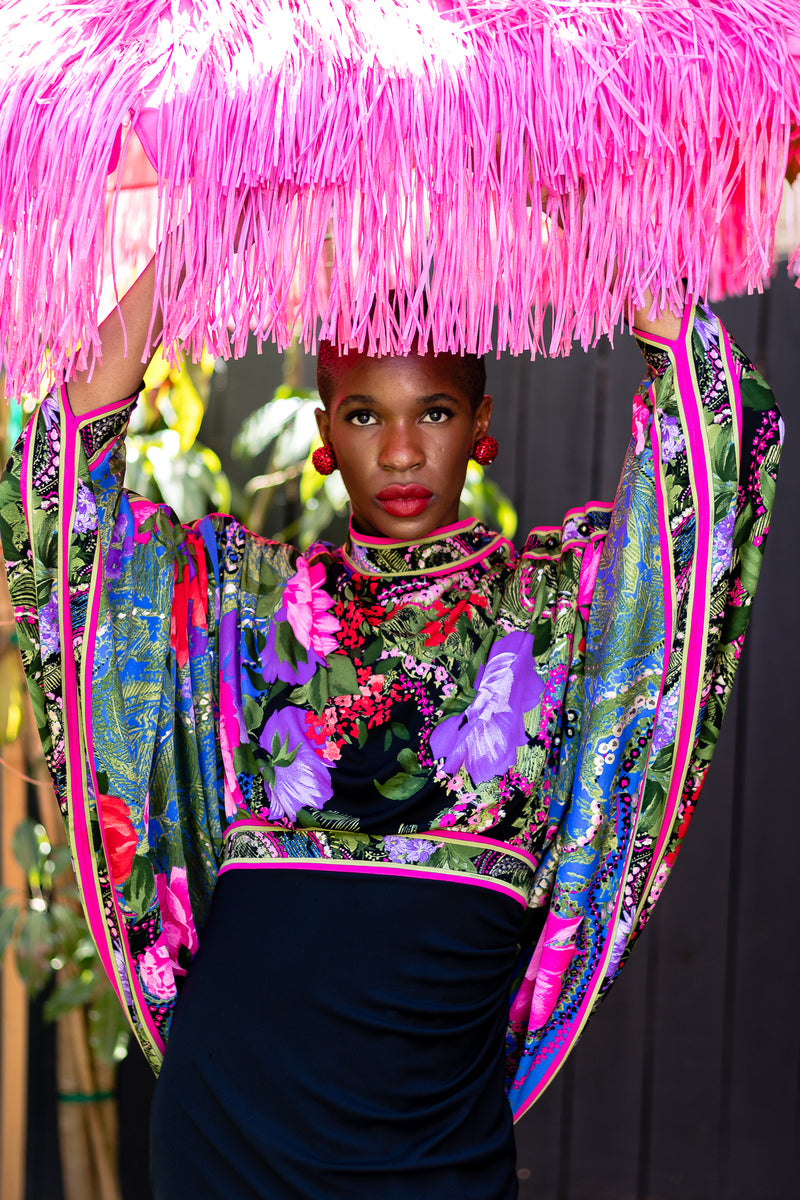 Monica Ahanonu in Vintage Leonard Floral Batwing Cape Gown at Recess Los Angeles