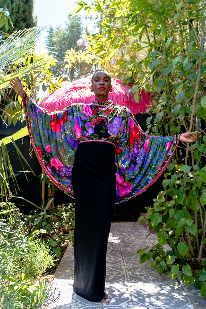 Monica Ahanonu in Vintage Leonard Floral Batwing Cape Gown at Recess Los Angeles