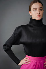 Girl in Vintage Issey Miyake Pleats Please Pleated Turtleneck Top at Recess Los Angeles