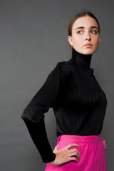 Girl in Vintage Issey Miyake Pleats Please Pleated Turtleneck Top at Recess Los Angeles